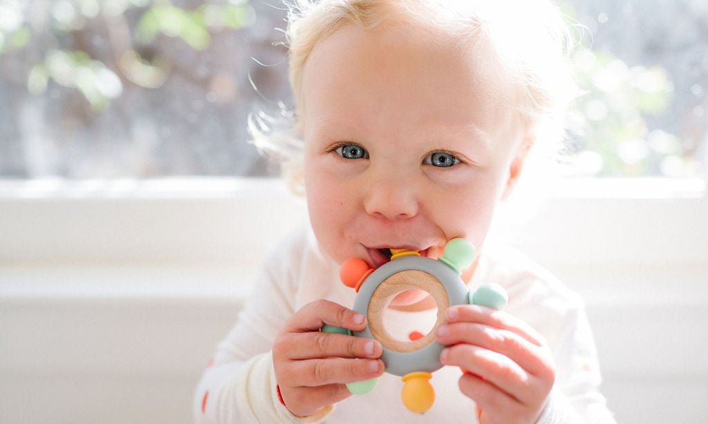Captains Teether - Bannor-toys - little girl chewing on a teether